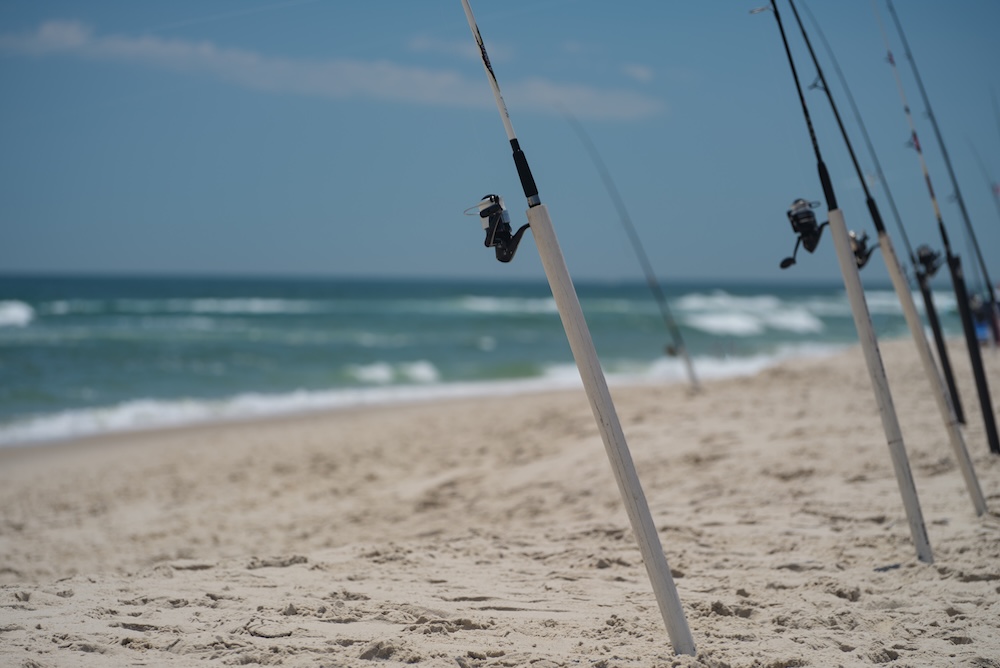 fishing poles on coast of island